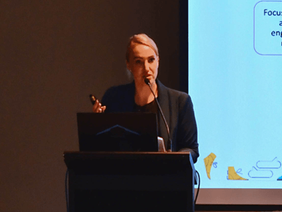 CoAct EMG team member presenting to Service Partner staff