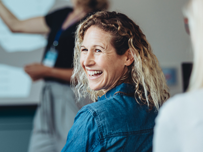 Staff member undertaking training with her team